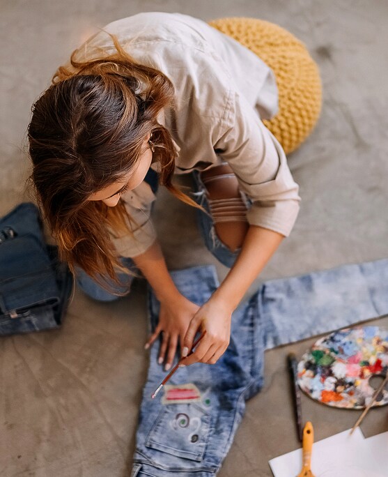 photo of woman doing hands on hobby 