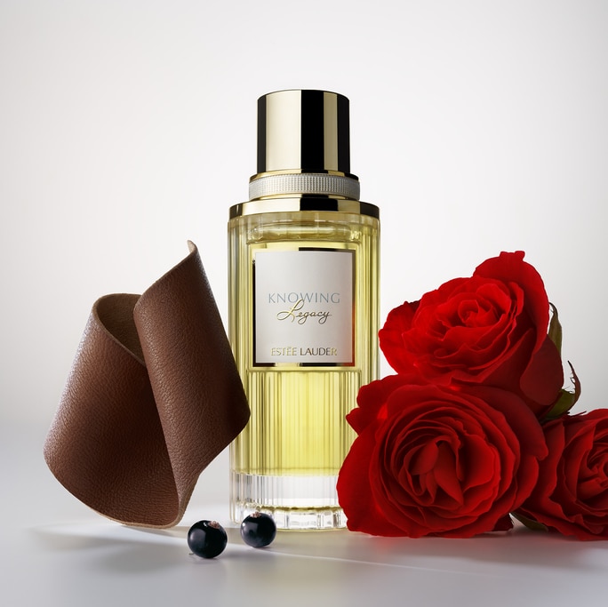 New Knowing legacy fragrance with notes pictured arround the bottle